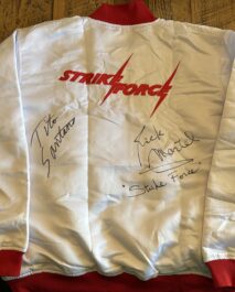 SIGNED SOUVENIR JACKET - STRIKE FORCE - TITO SANTANA & RICK MARTEL